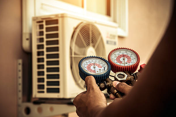 Professional Air Conditioning Service technician working in Gordon, TX